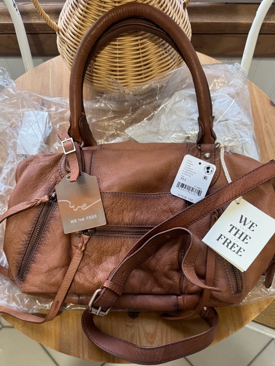 We The Free Handbags - We The Free baby Emerson in the color saddle brand new with tags
